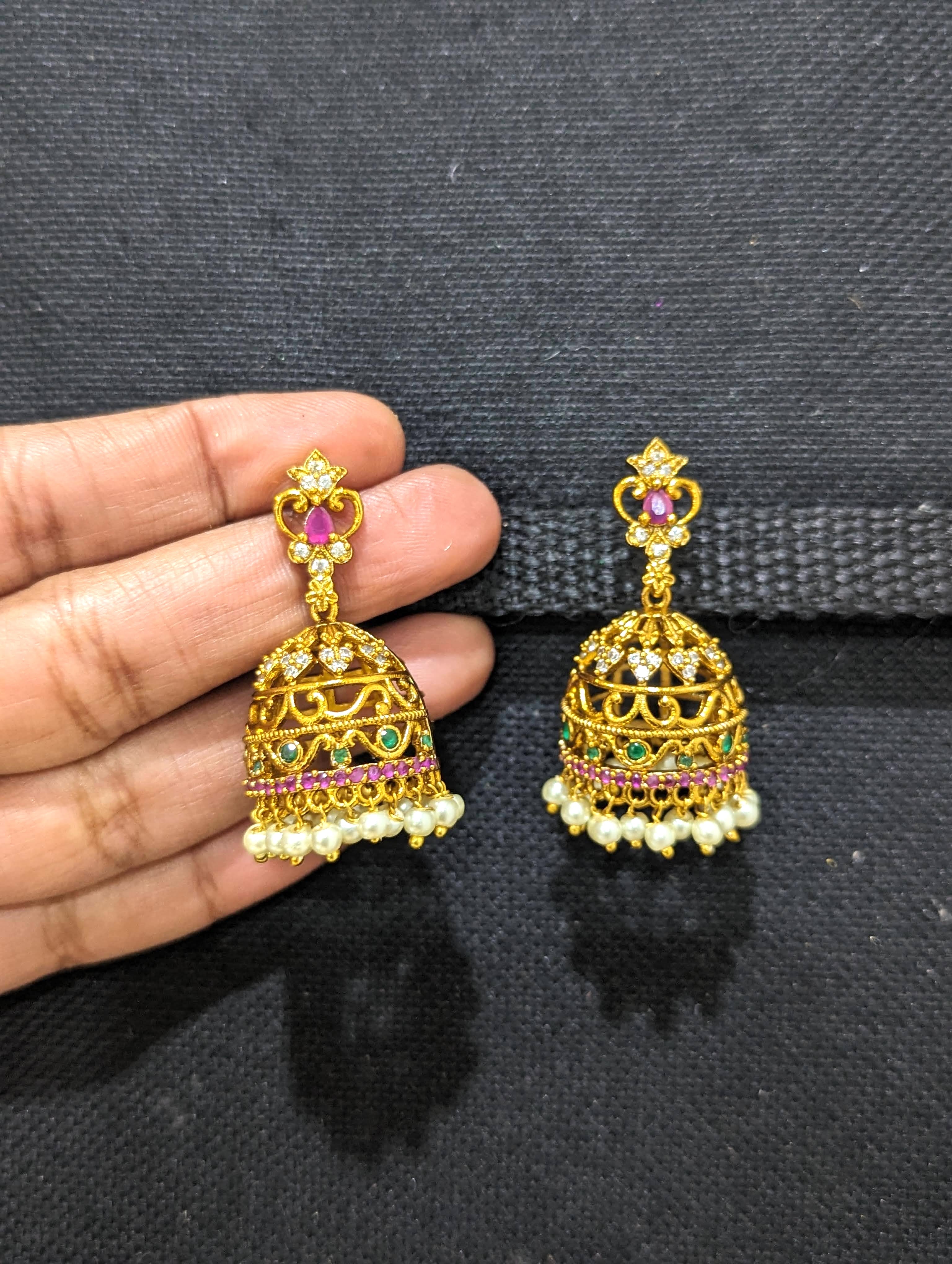 LeOvs Small Golden Jhumka Earrings with Black Beads